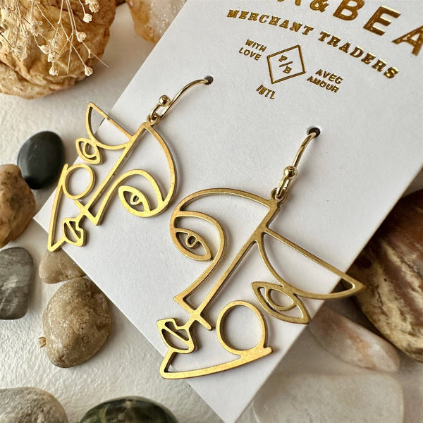 Klee Geometric Face Silhouette Drop Earrings In Raw Brass - Lady of the Lake